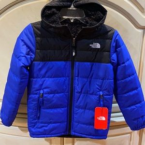 The North Face Reversible lined coat Youth Medium 10/12. New with tags.